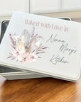 Personalised baked with love biscuit tin featuring floral kitchen design and custom wording for Mum or Nan