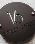 Mirror backed 3D round street number sign