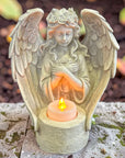 Decorative angel figurine with a LED candle