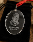 Personalised memorial glass ornament presented in a black velvet gift bag