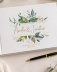 personalized white wedding guest book with a watercolor green leaf design