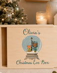 personalized light wood Christmas Eve box with a sliding lid