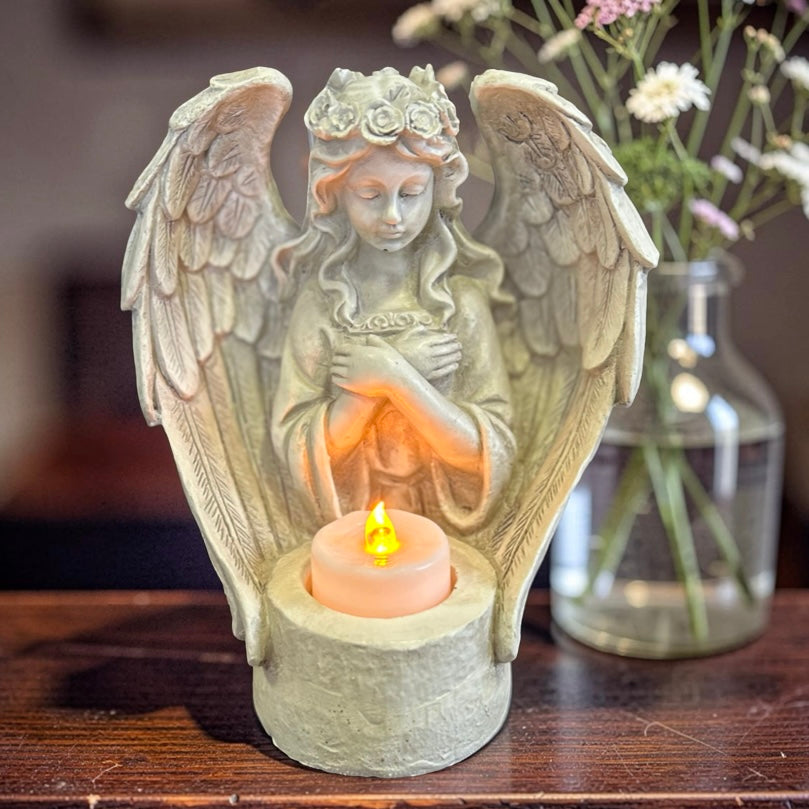 Memorial angel figurine with a  LED candle 