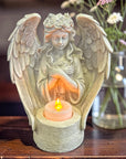 Memorial angel figurine with a  LED candle 
