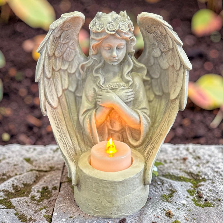 Decorative angel figurine with a LED candle