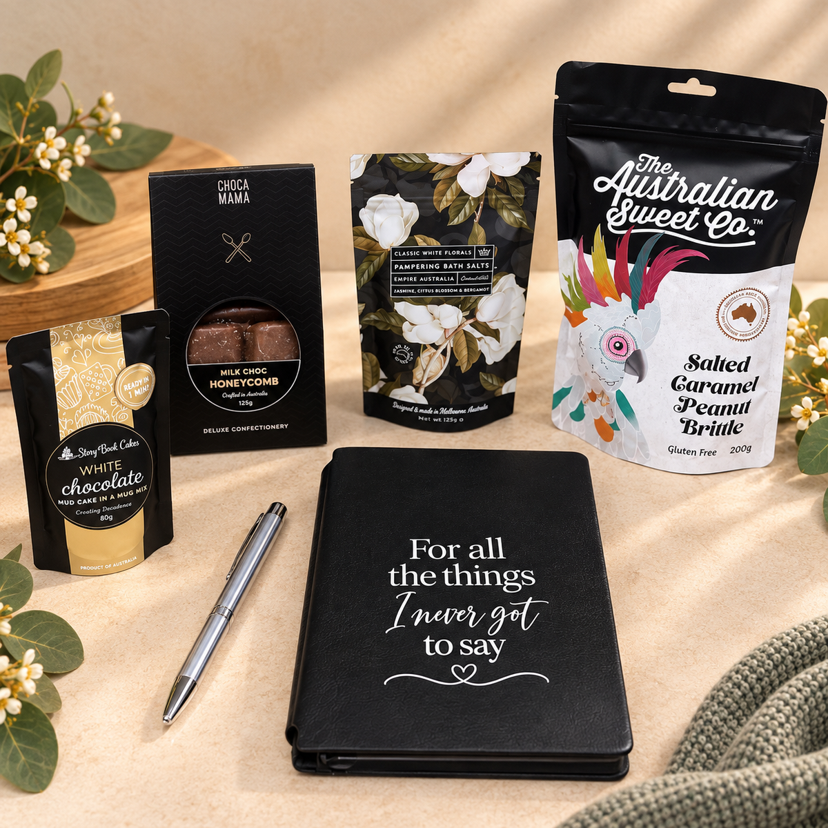 Bereavement care package with memorial journal chocolate treats peanut brittle and self-care gifts