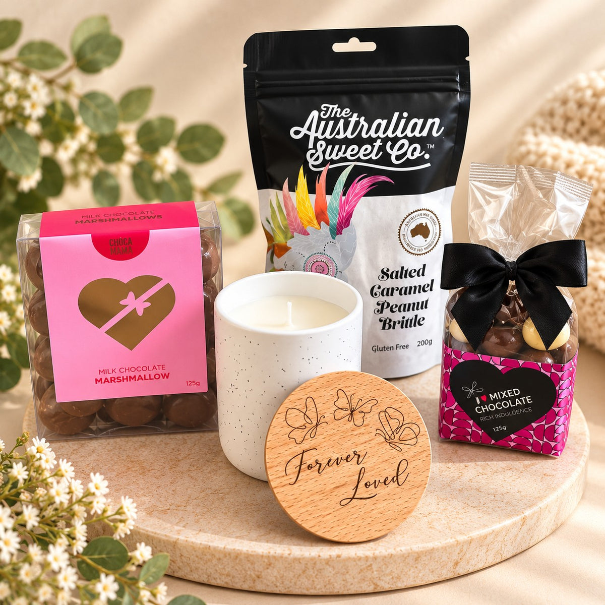 Forever Loved memorial gift hamper with candle and Australian made treats