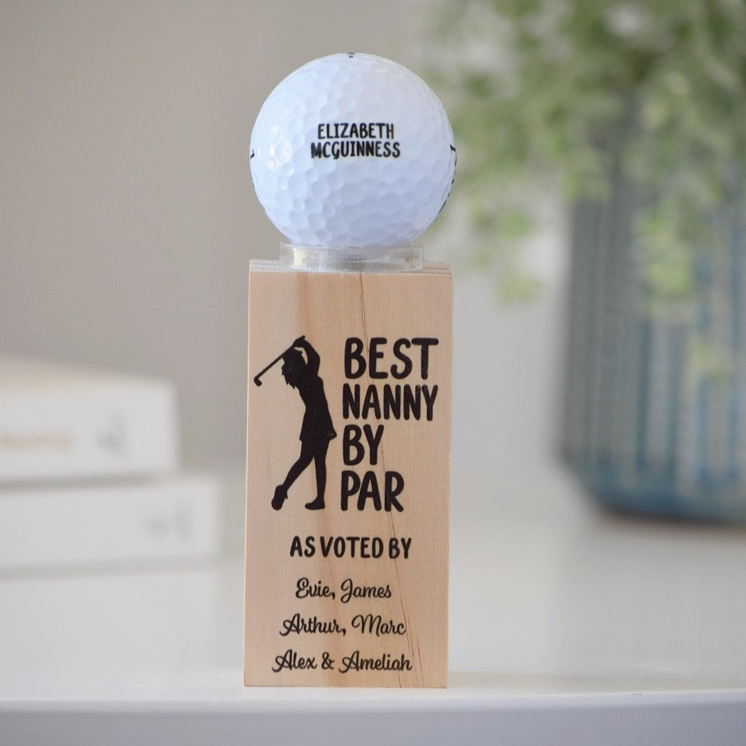Custom golf ball with name on wooden display stand, perfect Mother’s Day golf gift