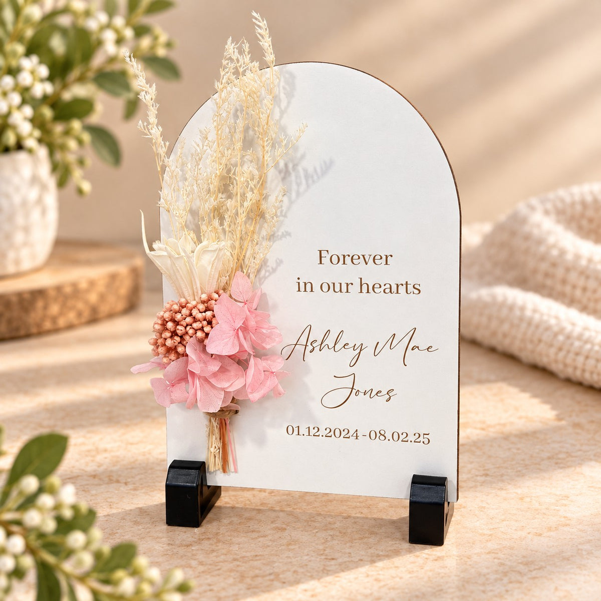 memorial plaque floral arch