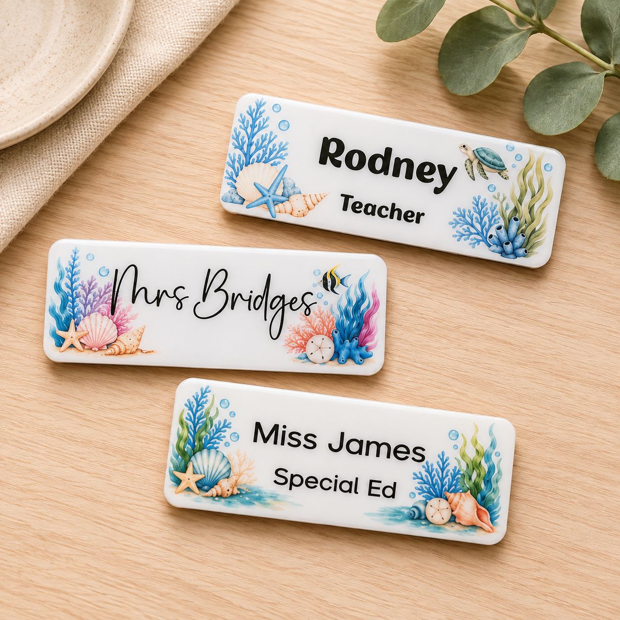 Colourful coral and seashell magnetic teacher name badge with custom name