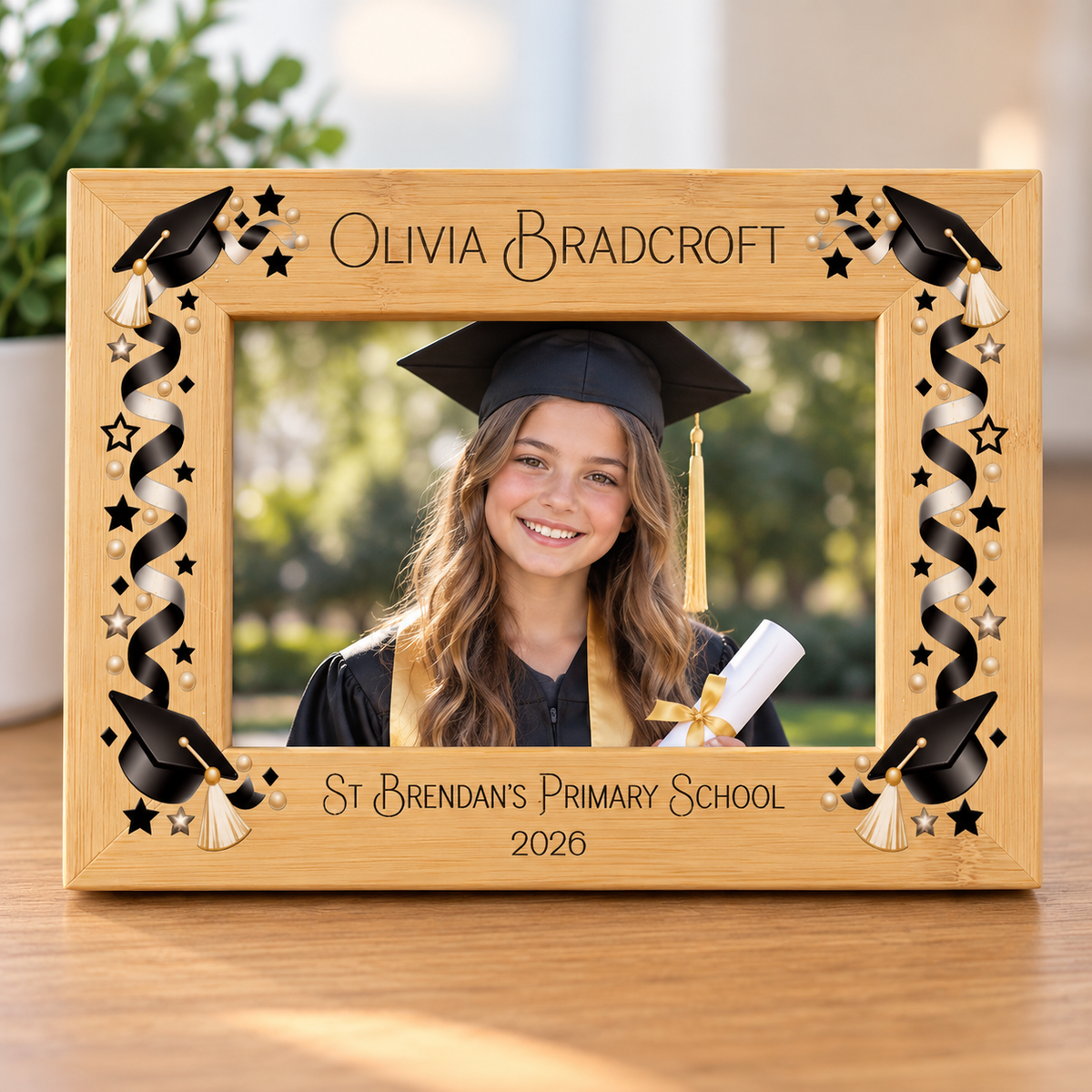 Personalised bamboo graduation photo frame with graduation photograph, name, school and year