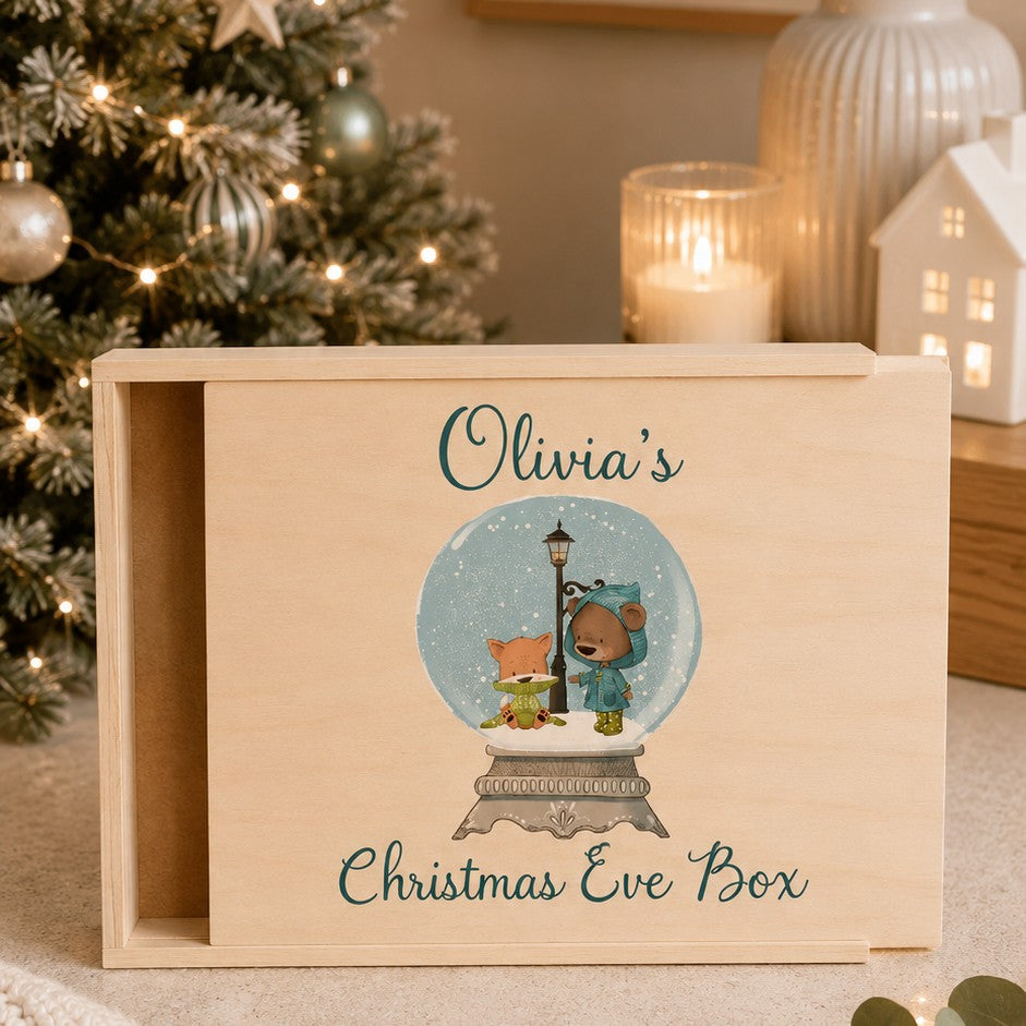 personalized light wood Christmas Eve box with a sliding lid